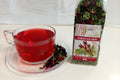 Hibiscus Mix kruidenthee sjoeroe hibiscus en moringa losse bladeren in theekop